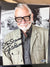 George Romero signed 8x10 w/inscription. Beckett coa