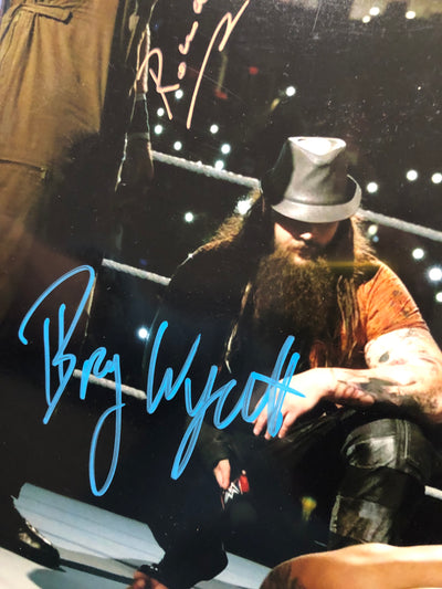 Wyatt Family 11x14 (a) signed by all 3 Bray, Braun & Rowan