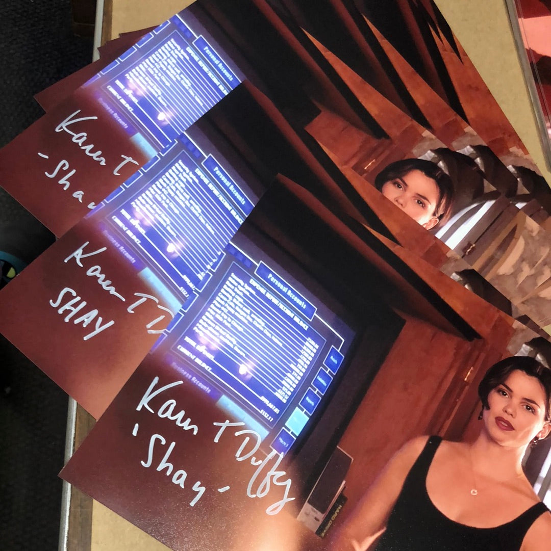 Blank Check ‘Shay’ 8x10 (b) signed by Karen Duffy – Leeloo Multiprops, LLC